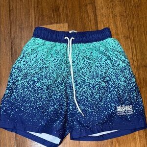 Men’s size medium, swim trunks excellent condition from Xel-ha in Mexico